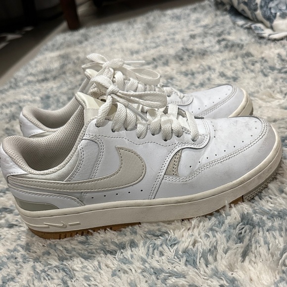 Nike Shoes - Nike White Low-Top Sneakers with Cream Swoosh